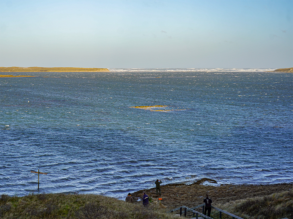 De Slufter vol water gezien vanaf de sluftertrap